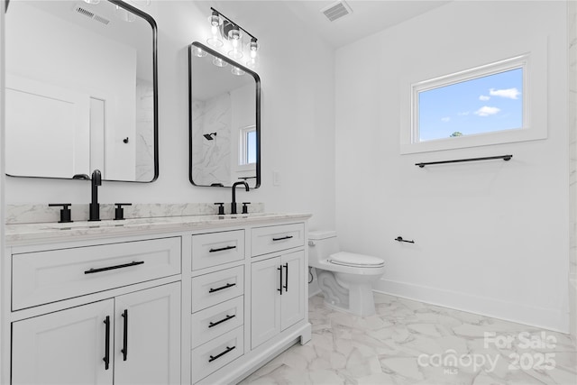 bathroom featuring visible vents, baseboards, toilet, and marble finish floor