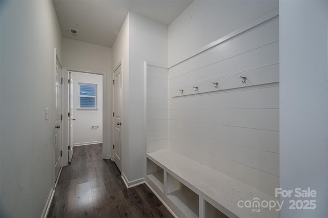 mudroom with dark hardwood / wood-style floors