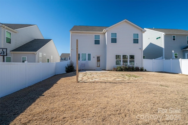 back of property featuring a patio