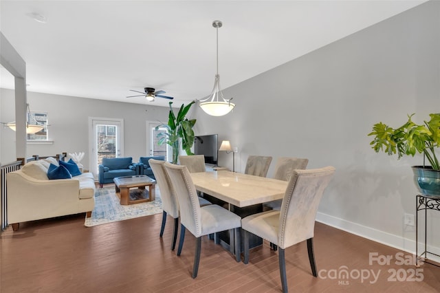 dining room featuring dark hardwood / wood-style flooring