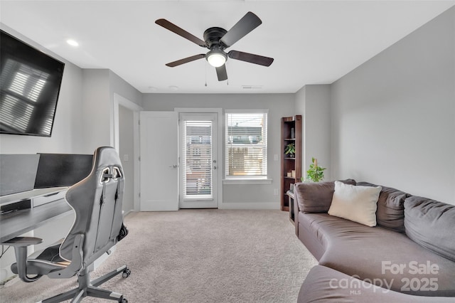 home office with light colored carpet and ceiling fan