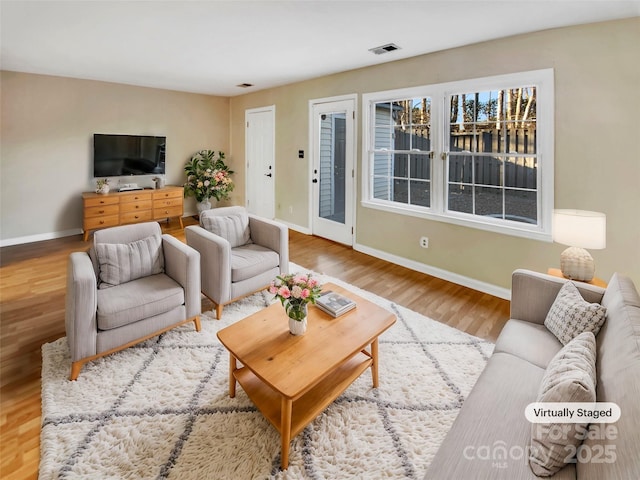 living room with hardwood / wood-style floors