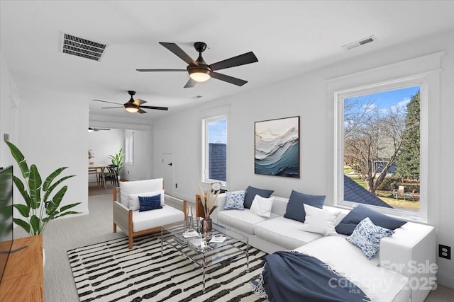 living room featuring plenty of natural light