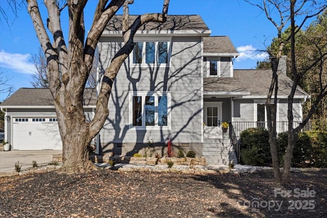 view of front of home with a garage