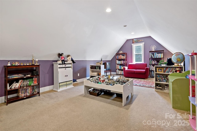 recreation room featuring light carpet, baseboards, vaulted ceiling, and recessed lighting