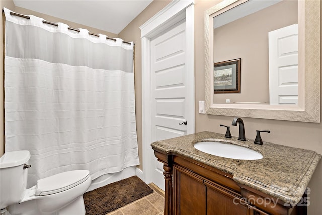 full bath featuring toilet, a shower with shower curtain, and vanity