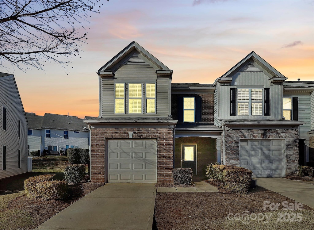 view of front of home with a garage