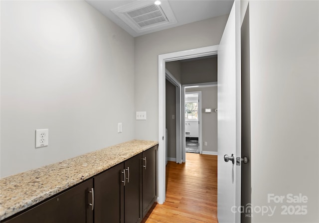 hall featuring light hardwood / wood-style floors