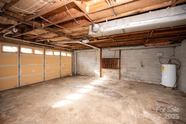 garage featuring gas water heater