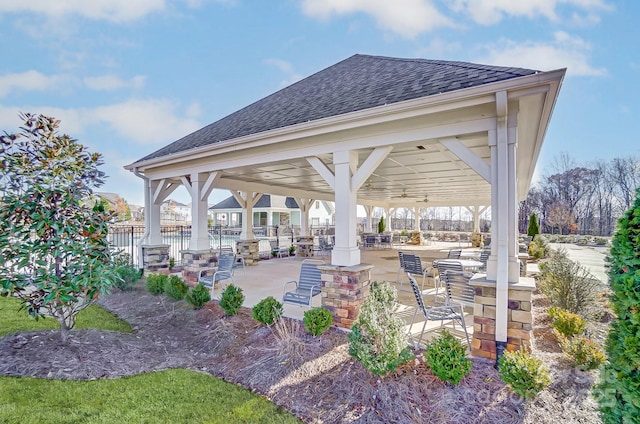 view of home's community with a gazebo and a patio area