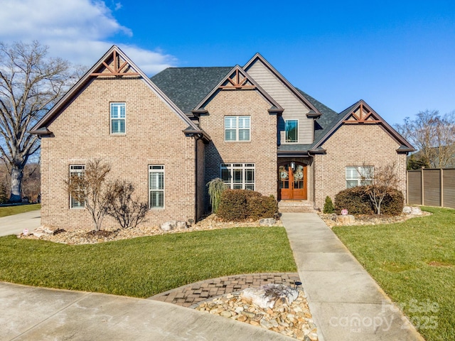 view of front of home featuring a front lawn