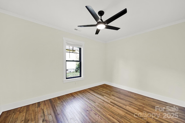 spare room with crown molding, wood-type flooring, and ceiling fan