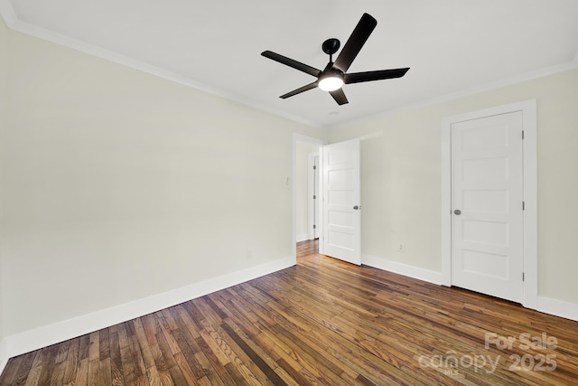 unfurnished room with dark wood-type flooring, ceiling fan, and ornamental molding