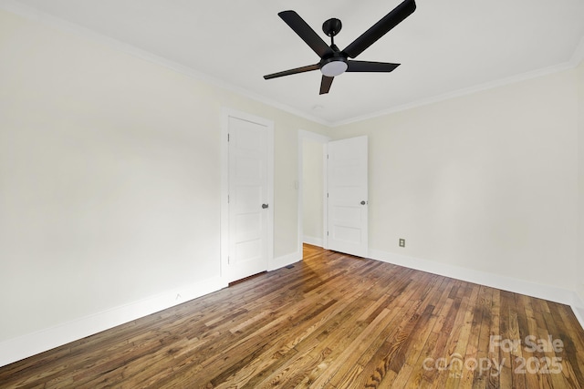 unfurnished room with crown molding, ceiling fan, and hardwood / wood-style flooring