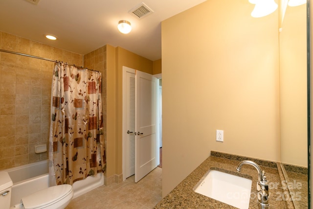 full bathroom featuring vanity, toilet, and shower / tub combo