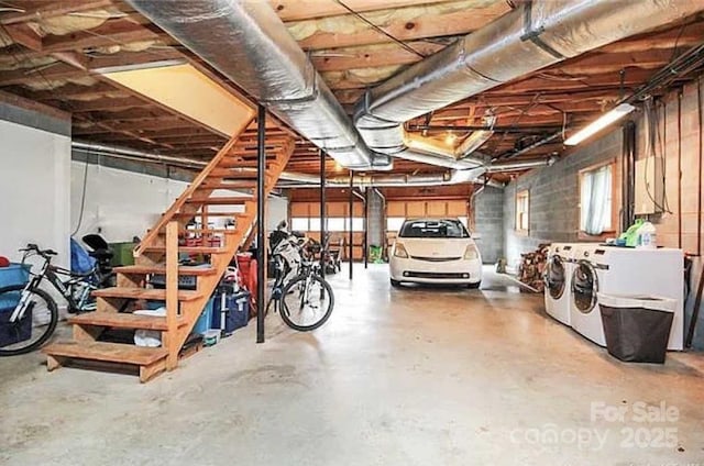 garage with washer and dryer