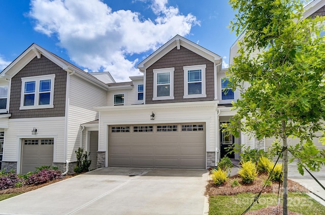 craftsman inspired home with a garage