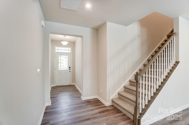 foyer featuring hardwood / wood-style floors