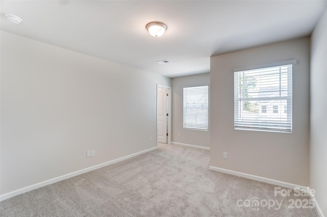 view of carpeted spare room