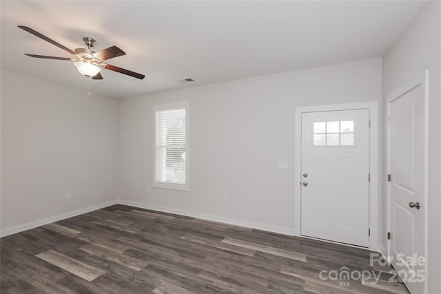 entrance foyer with ceiling fan and dark hardwood / wood-style floors