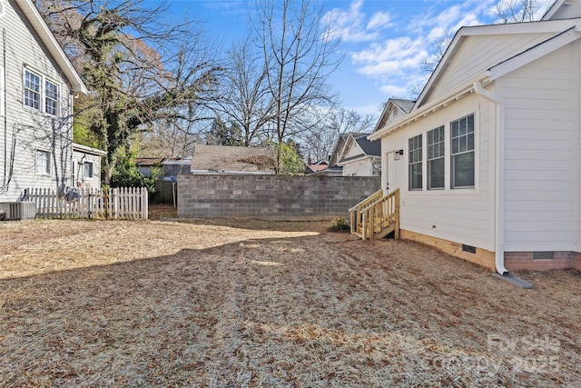 view of yard featuring central AC