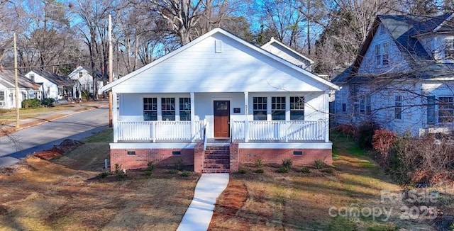 bungalow-style home featuring a porch