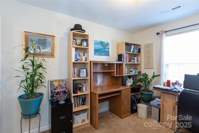 office area with light colored carpet