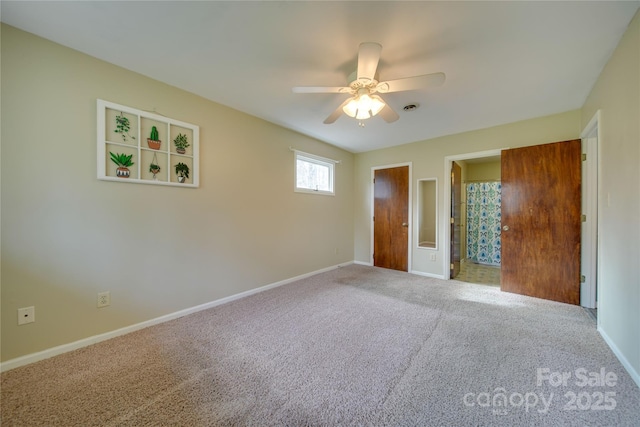 unfurnished bedroom featuring carpet and ceiling fan