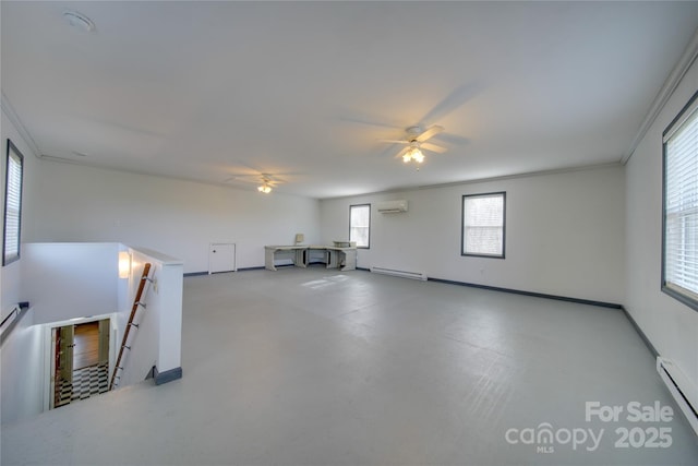 spare room with an AC wall unit, ceiling fan, a baseboard heating unit, and crown molding