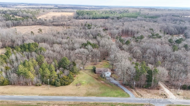 birds eye view of property featuring a rural view