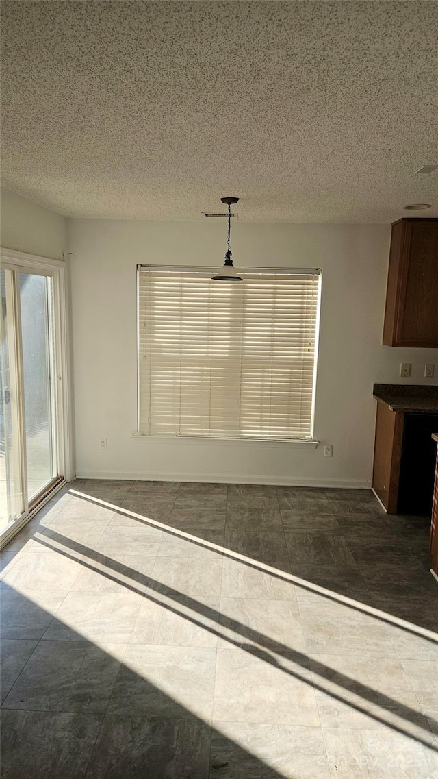 view of unfurnished dining area