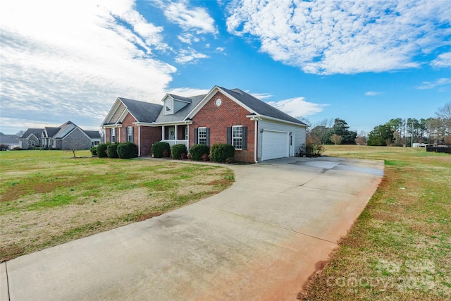 view of front of house featuring a garage and a front lawn