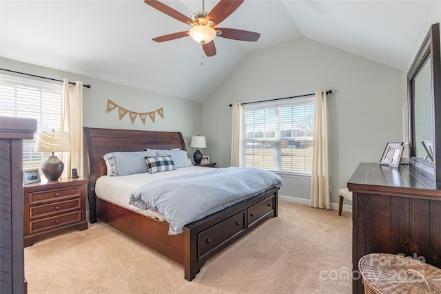 bedroom with ceiling fan, light carpet, and lofted ceiling