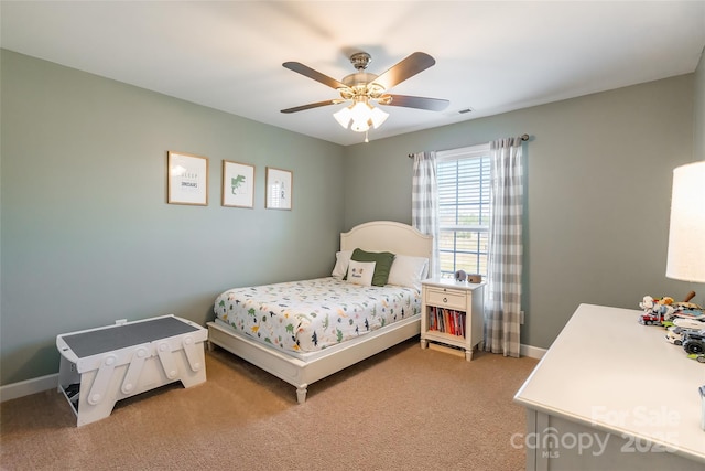 carpeted bedroom with ceiling fan