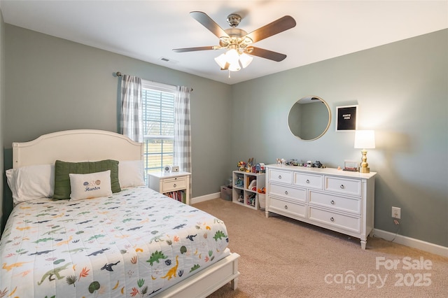 bedroom featuring light carpet and ceiling fan