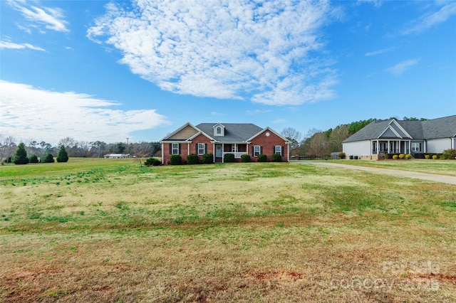 ranch-style house with a front yard