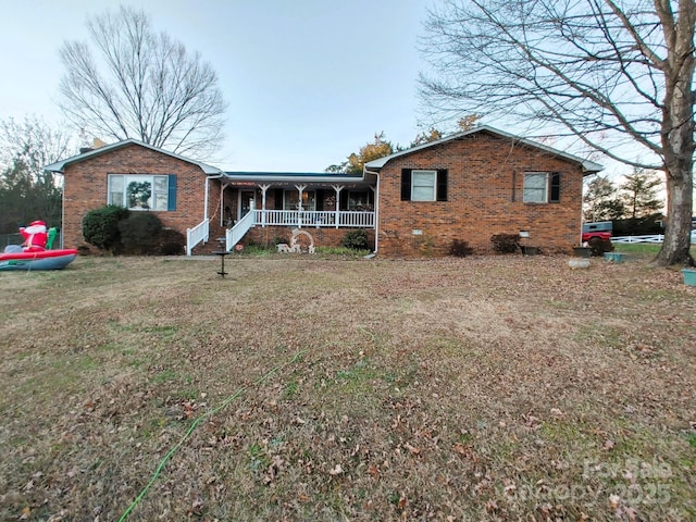 ranch-style house with a porch