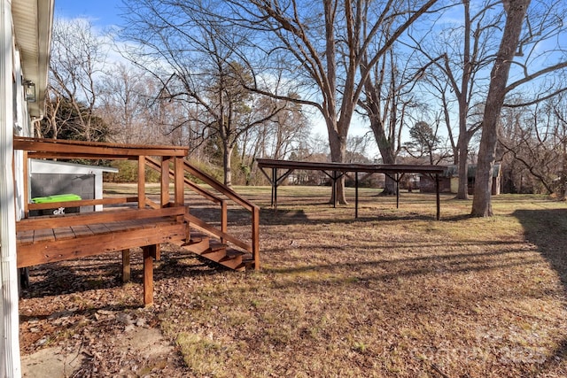 view of yard featuring a deck