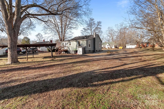 view of yard featuring a carport