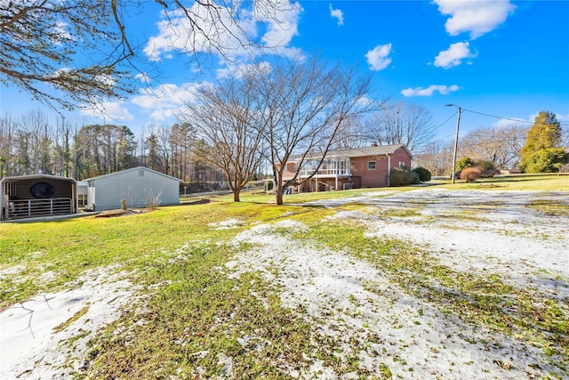 view of yard with a carport