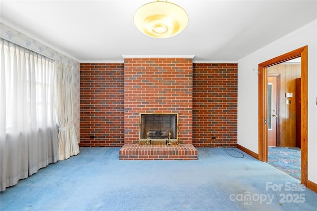 unfurnished living room featuring a fireplace, crown molding, and carpet floors