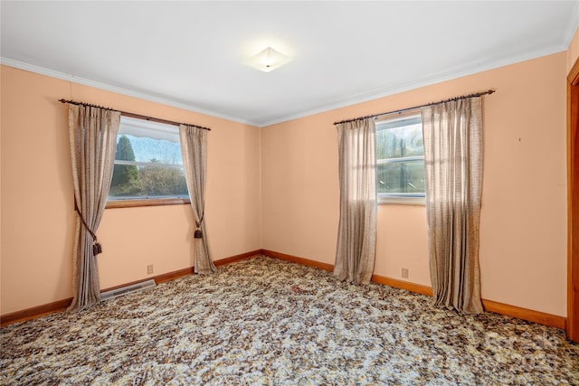 carpeted empty room featuring ornamental molding