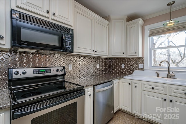 kitchen with stainless steel appliances, tasteful backsplash, white cabinetry, ornamental molding, and sink