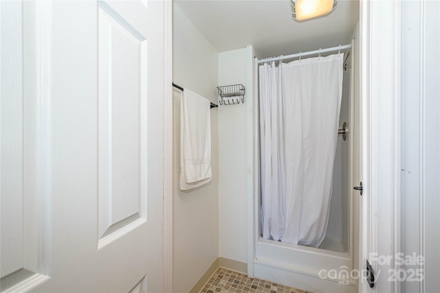 bathroom featuring walk in shower