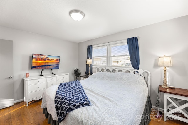 bedroom featuring dark hardwood / wood-style floors