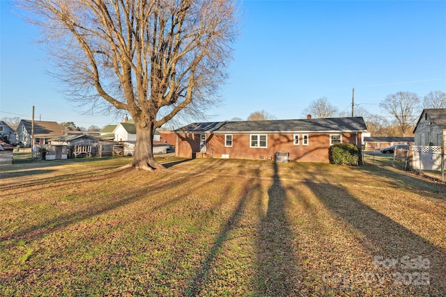 exterior space featuring a front lawn