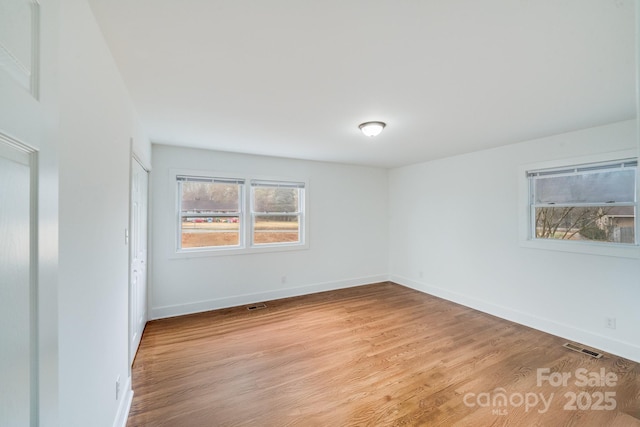 empty room featuring light wood-type flooring