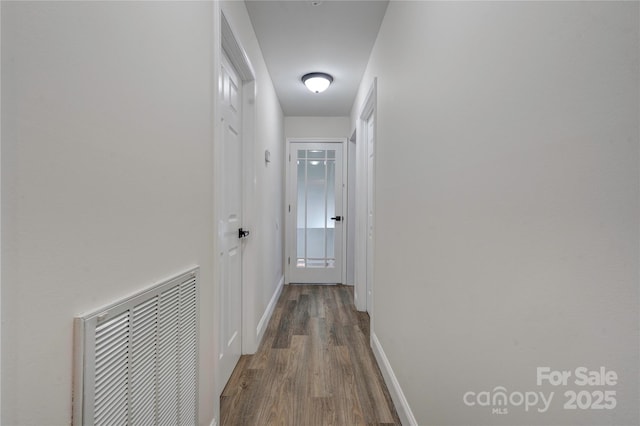 hallway featuring hardwood / wood-style flooring