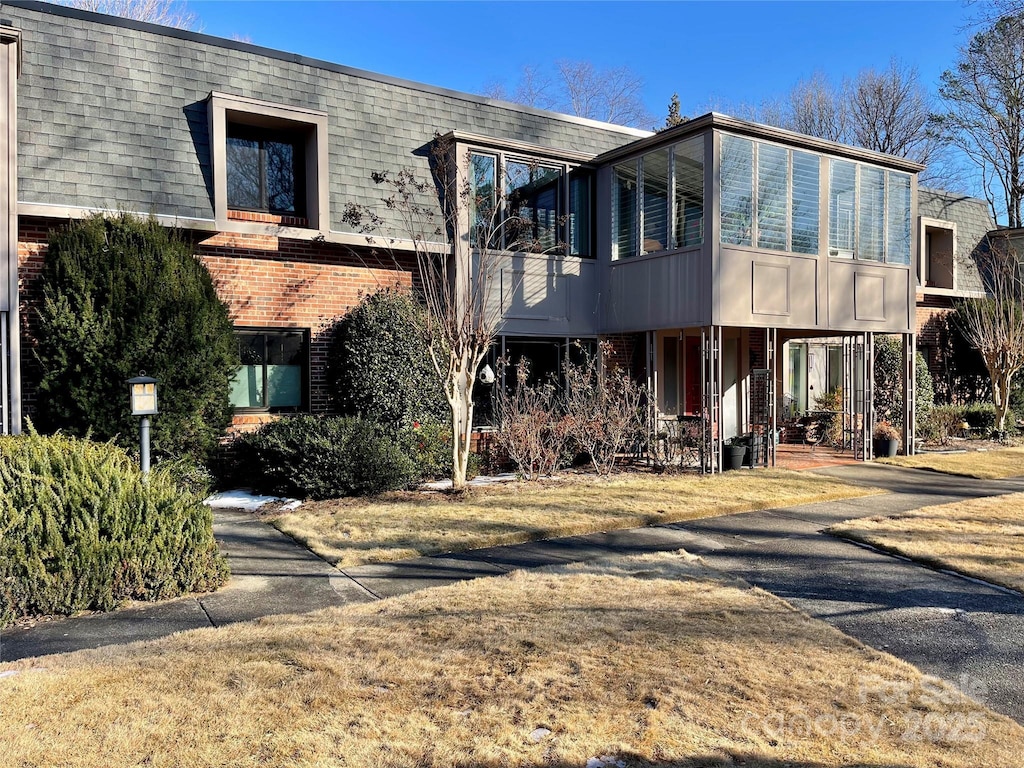 exterior space featuring a carport