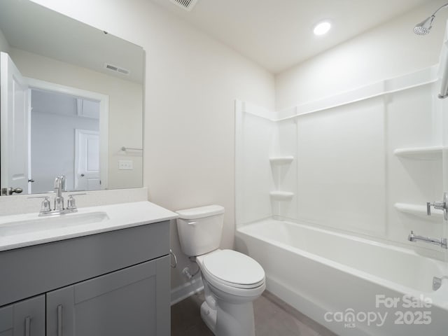 full bathroom featuring bathtub / shower combination, vanity, and toilet